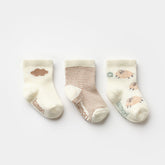 3-pack of neutral baby socks with sheep, stripe, and cloud patterns